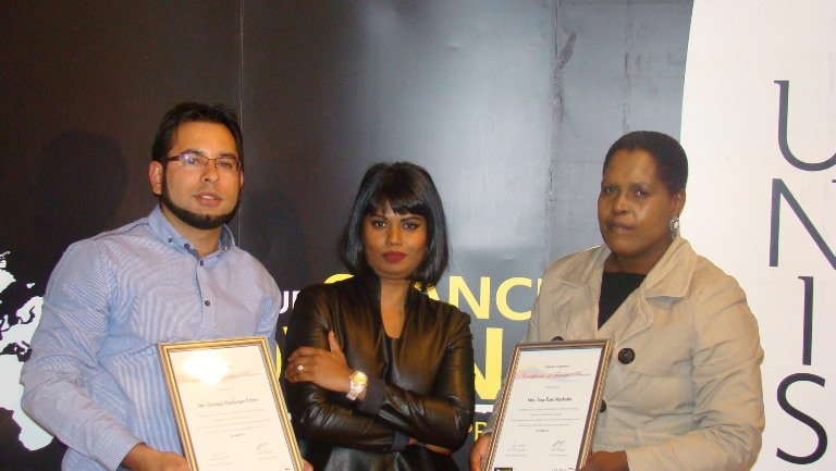 C2A Project Manager Dr Genevieve James (centre) awarded Mr Chevaan Peters (left) and Mrs Rose Mashaba (right) with a certificate of faithful service
