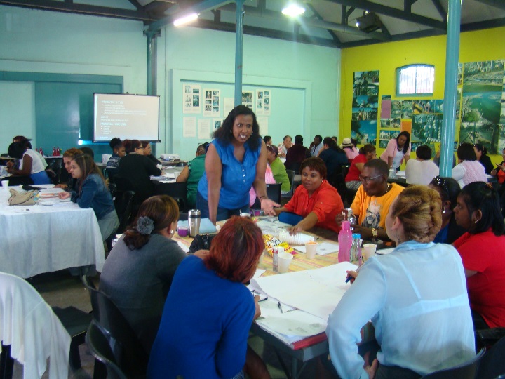Facilitator Dr Jane Sethusha engaging with participants in group activities
