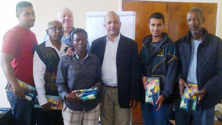 Prize winners with Pro Vice-Chancellor of Unisa Professor Narend Baijnath in the Introduction to Plumbing workshop