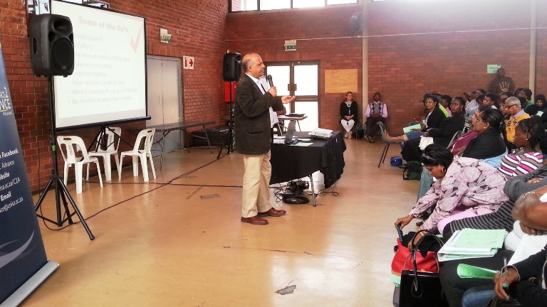 Pro Vice-Chancellor of Unisa Professor Narend Baijnath addresses members of the community at Chance 2 Advance workshops 