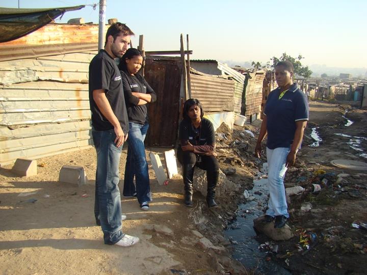 C2A team in deep thought in the community of Diepsloot