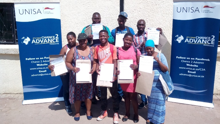 Some of the participants of the Diepsloot programme displaying their certificates of attendance