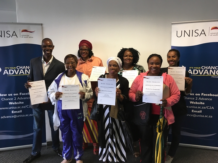 Participants from C2A Alexandra programme showcasing their certificates 