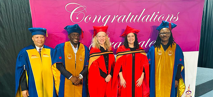 Teaser_Picture with PhD Graduate.png