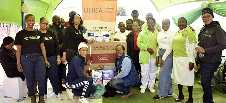 Unisans commemorate Mandela Day with the elderly