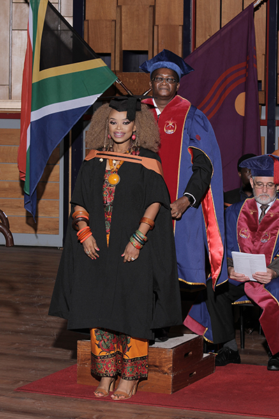 Zoleka%20Mandela%20is%20hooded%20at%20her%20graduation%20by%20Prof.%20Michael%20Temane%20(Acting%20Registrar)