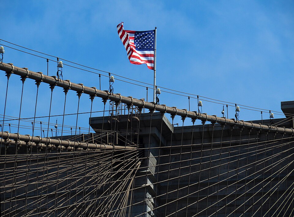 US flag on the steel cables of the Brooklyn Bridge