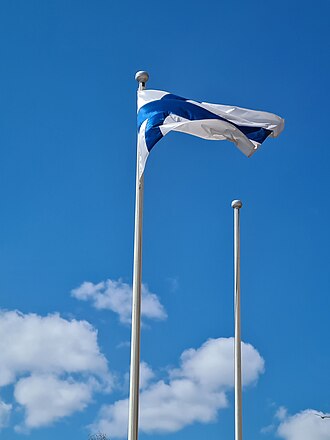 The Finnish flag against the sky