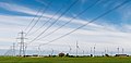 Wind turbines and power lines, East Sussex