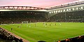 A Premier League football match between Liverpool FC and Portsmouth FC at Anfield Stadium.