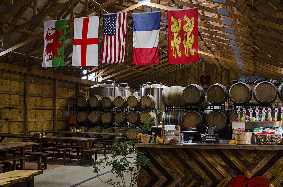 Flags (Welsh, English, American, French, and Normandy) at Virtue Cider.