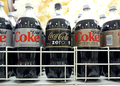 X is the product labels (allowed as the designs are below TOO; see also Ets-Hokin v. Skyy Spirits, Inc.). Simply depicting multiple Xs grouped together does not qualify as de minimis; contrast with criteria 3 and 5 above.