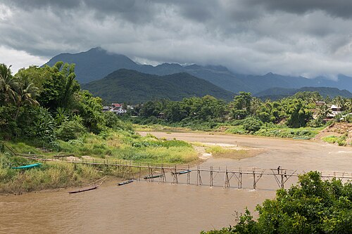 Working at the consolidation of a wooden footbridge in Luang Prabang