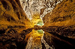 Third place: Cueva de los Verdes, Canary Islands, Spain. Reflection on water. (POTD) Luc Viatour (Lviatour)