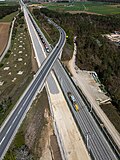 * Nomination Bridge of the ST2244 over the high-speed line Nuremberg-Ebensfeld before Hirschaid during the construction of the new line, aerial view --Ermell 07:49, 31 May 2025 (UTC) * Promotion  Support Good quality. --Poco a poco 08:59, 31 May 2025 (UTC)