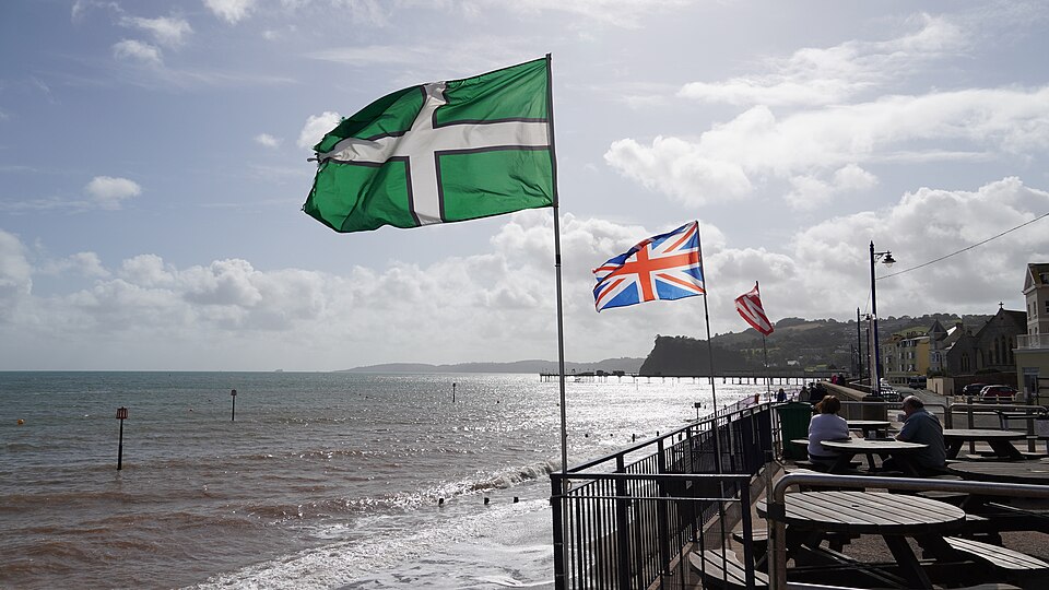 Devon flag and Union jack at the seafront of Teignmouth, Devon, England
