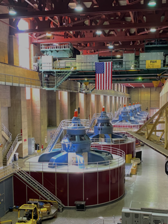 American flag hanging above the generators at the Hoover Dam