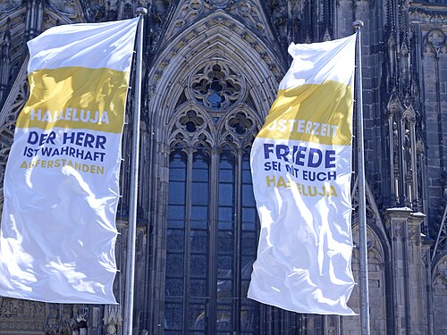 Cologne Cathedral with flags at Easter time