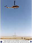 X-36 Carried Aloft by Helicopter during Radio and Telemetry Tests (4857948389).jpg