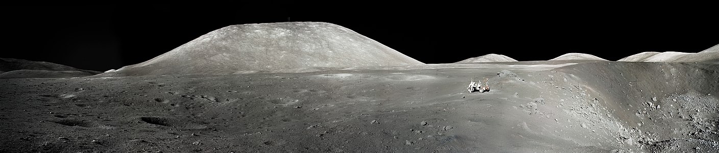 Apollo 17 astronauts Dr. H. Jack Schmitt and Gene Cernan took this image of the Moon's Taurus-Littrow valley. The view shows the lunar roving vehicle near the rim of Shorty crater. In the distance are the mountain-like massifs that define the Taurus-Littrow valley. This region marks the last time - December 1972 - that humans walked and drove on the Moon's surface.