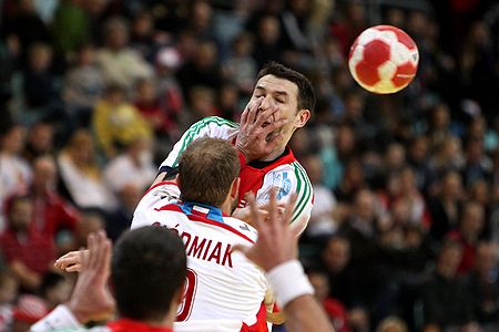 Ferenc Ilyés), hungarian Handball-Player, blocked with foul by Artur Siódmiak (Poland