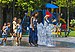 Woman leading children into fountain on Como lakefront.jpg