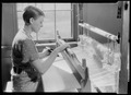 "Alice McCarter, weaving a baby blanket at the Pi Beta Phi School, Gatlinburg, Tennessee. This particular material is... - NARA - 532764.tif
