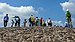 Wide view of tourists at top of Pyramid of the Sun, Teotihuacan.jpg