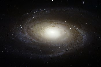 The spiral galaxy Messier 81 is tilted at an oblique angle on to our line of sight, giving a "birds-eye view" of the spiral structure