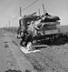 "Broke, baby sick, and car trouble!" - Dorothea Lange's photo of a Missouri family of five in the vicinity of Tracy, California.jpg