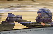 SSG Desiree Palacios makes final settings on her camera before a sortie in a F-16D Fighting Falcon.jpg