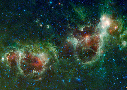 The Heart and Soul nebulae are seen in this infrared mosaic from NASA's Wide-field Infrared Survey Explorer, or WISE. Also visible near the bottom of this image are two galaxies, Maffei 1 and Maffei 2. Maffei 1 is the bluish elliptical object and Maffei 2 is the spiral galaxy.