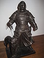 Mongol hunter with tame cheetah
