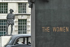 A London cab zooms between two monuments on Whitehall Wikipedia London Portal showcase picture for April 2008.