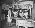 "... WAAC cooks prepare dinner for the first time in new kitchen at Fort Huachuca, Arizona.", 12-05-1942 - NARA - 531152.tif