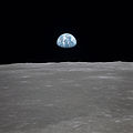 Earth Rises Over Lunar Horizon (AS11-44-6553).jpg