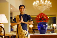 An Oberoi Hotel employee doing Namaste, New Delhi.jpg